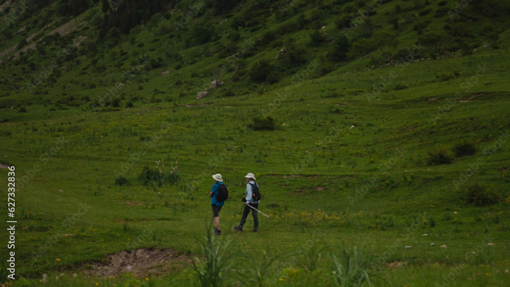 Couple hiking in the pyrenees. Lalarri path Couple hiking in the pyrenees. Lalarri path