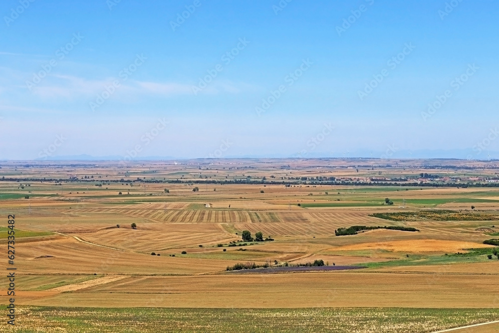 A plateau landscape with fields of cultivation and agriculture