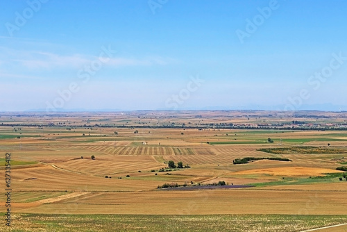 A plateau landscape with fields of cultivation and agriculture