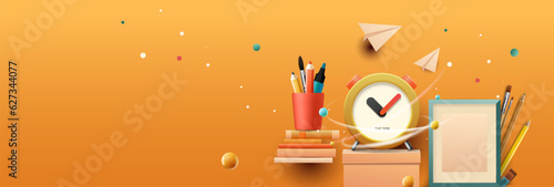 Back to school banner. School workspace with school stationery, orange background