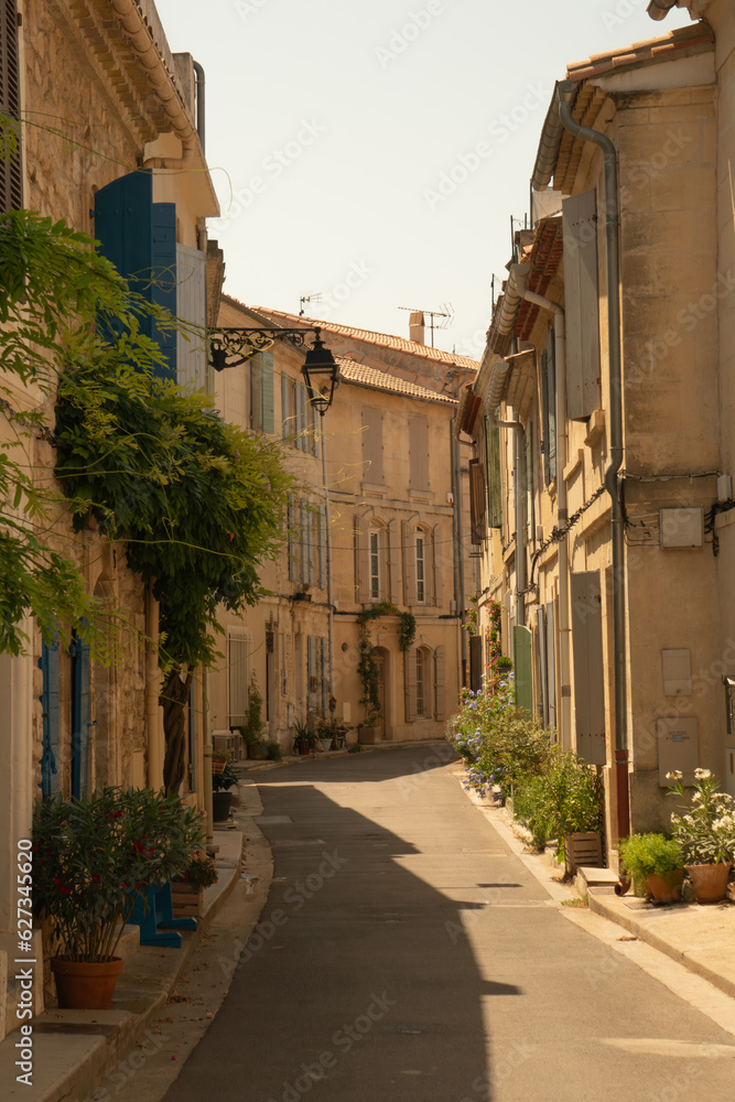 Street of old town of Arles, south of France, mediterranean architecture, colourful buildings