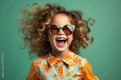 Young girl with hands raised