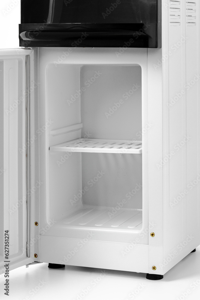 Open empty mini fridge isolated on white background Open empty mini fridge isolated on white background