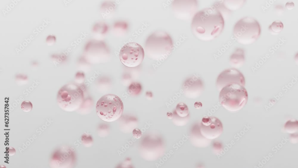 Close up rising up bubbles pink on white background Close up rising up bubbles pink on white background