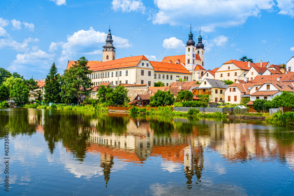 Panorama of Telč with water reflections on the lake in Telč, Czech Republic