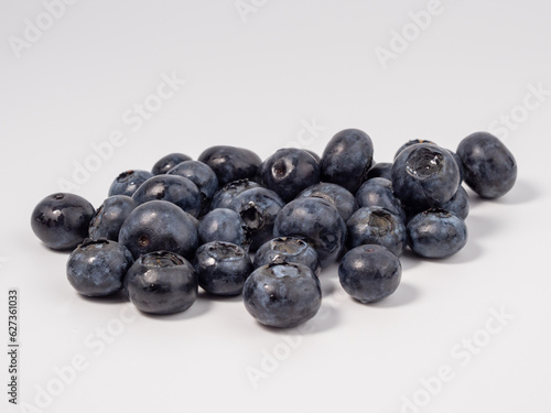 Ripe blueberries on a light background. blueberries close up