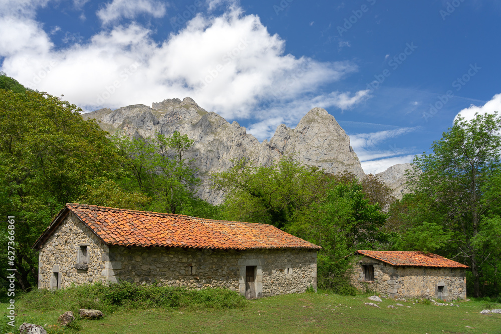 Typical stone barn of Picos de Europa to spend the winter with the livestock in Vegabaño. Leon, Spain Typical stone barn of Picos de Europa to spend the winter with the livestock in Vegabaño. Leon, Spain