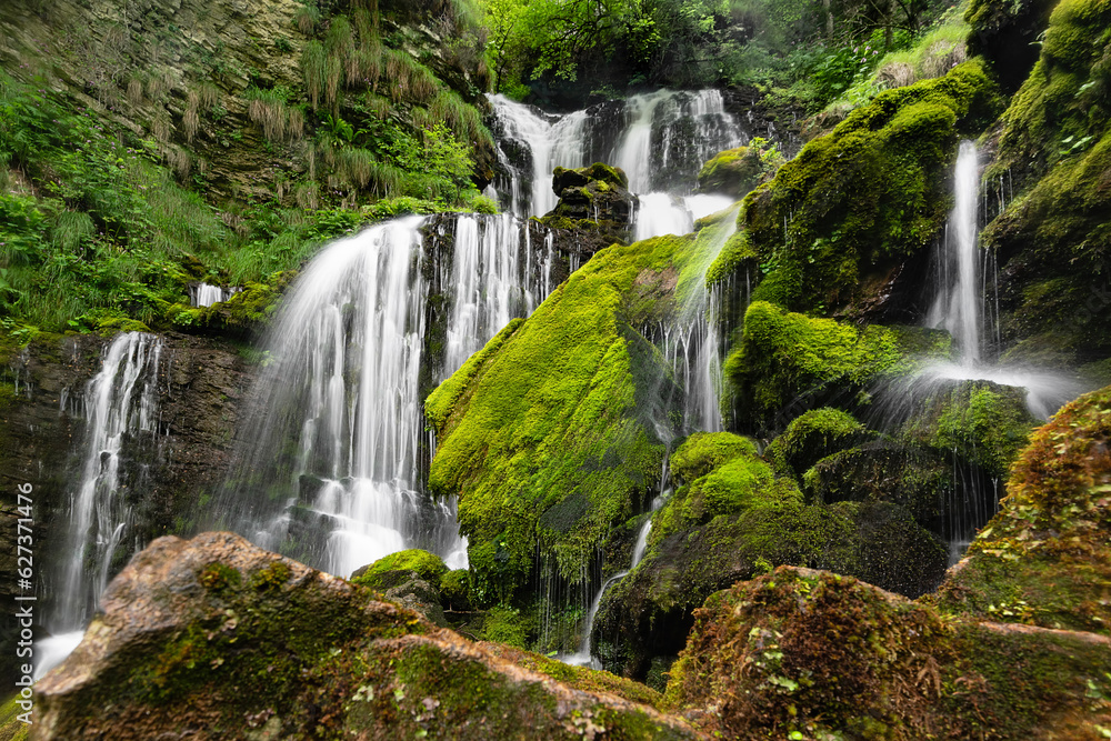 Fototapeta premium Wild Alps, the green waterfall