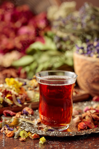 Herbal tea and a mix of various dried medicinal plants and herbs.