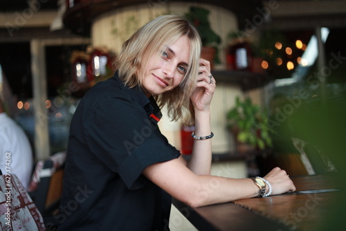 woman drinking coffee in cafe © Виктория