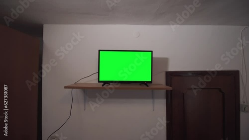 Wallpaper Mural Green screen television in an old and dark room Torontodigital.ca