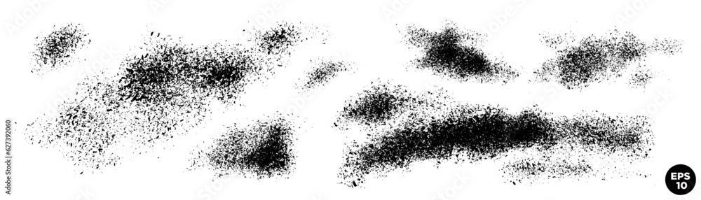 Set of brush strokes. Abstract grained black spots on white background. Artistic backgrounds.