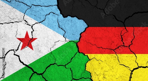 Flags of Djibouti and Germany on cracked surface - politics, relationship concept