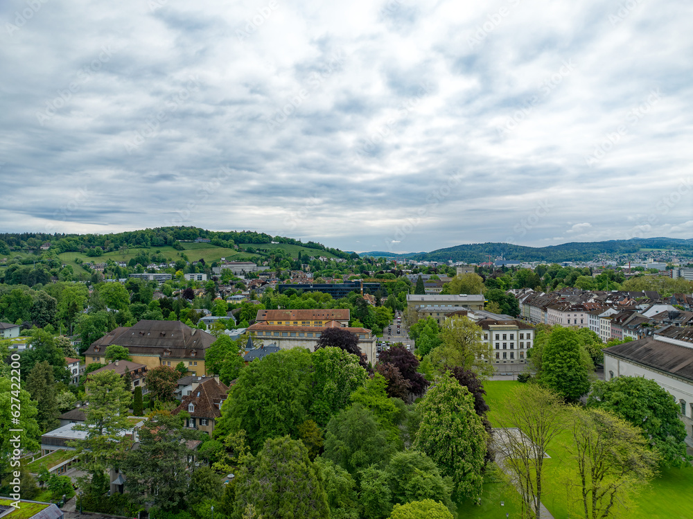 Aerial view of Swiss City of Winterthur with buildings, streets and scenic landscape on a cloudy spring morning. Photo taken May 17th, 2023, Winterthur, Switzerland.