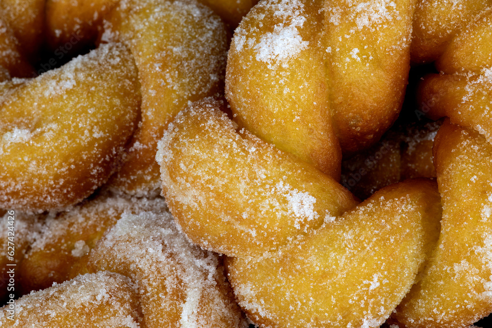 A Pile of Freshly Made Sugar Donuts Closeup View