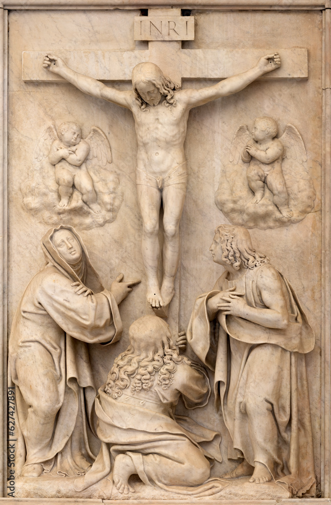 NAPLES, ITALY - APRIL 19, 2023: The marble relief of Crucifixion in the church Chiesa di Sant Anna dei Lombardi by Giulio Mazzoni (1518 - 1590).