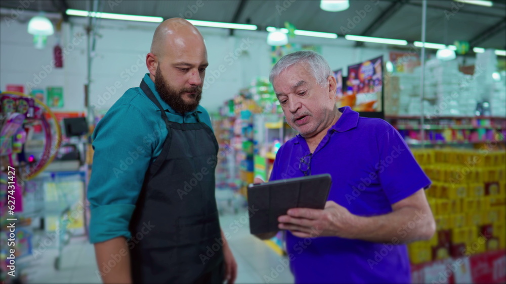 Supermarket Manager Addressing Inventory Issue with Employee, Strict Boss Reprimanding Staff Holding Tablet at Grocery Store, Dispute at Workplace Supermarket Manager Addressing Inventory Issue with Employee, Strict Boss Reprimanding Staff Holding Tablet at Grocery Store, Dispute at Workplace