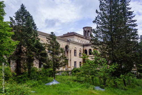 Ruined overgrown old abandoned Soviet sanatorium Iveria, Tskaltubo, Georgia photo