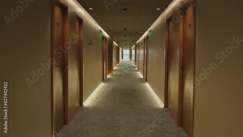 Footage of empty hotel corridor in modern hall with gorgeous interior. Sophisticated and luxury atmosphere. Aesthetic concept. Tranquility and elegance. Indoors. Daytime