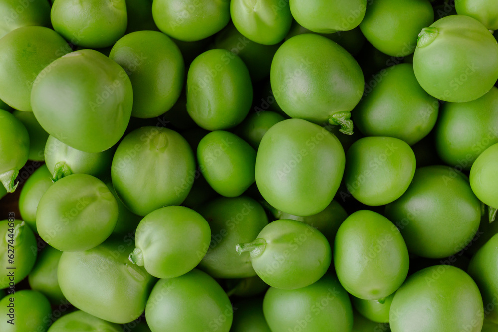 Green Pea. Green background. Peas background. Top view. Closeup. Macro shot of fresh pea. Green Pea. Green background. Peas background. Top view. Closeup. Macro shot of fresh pea.