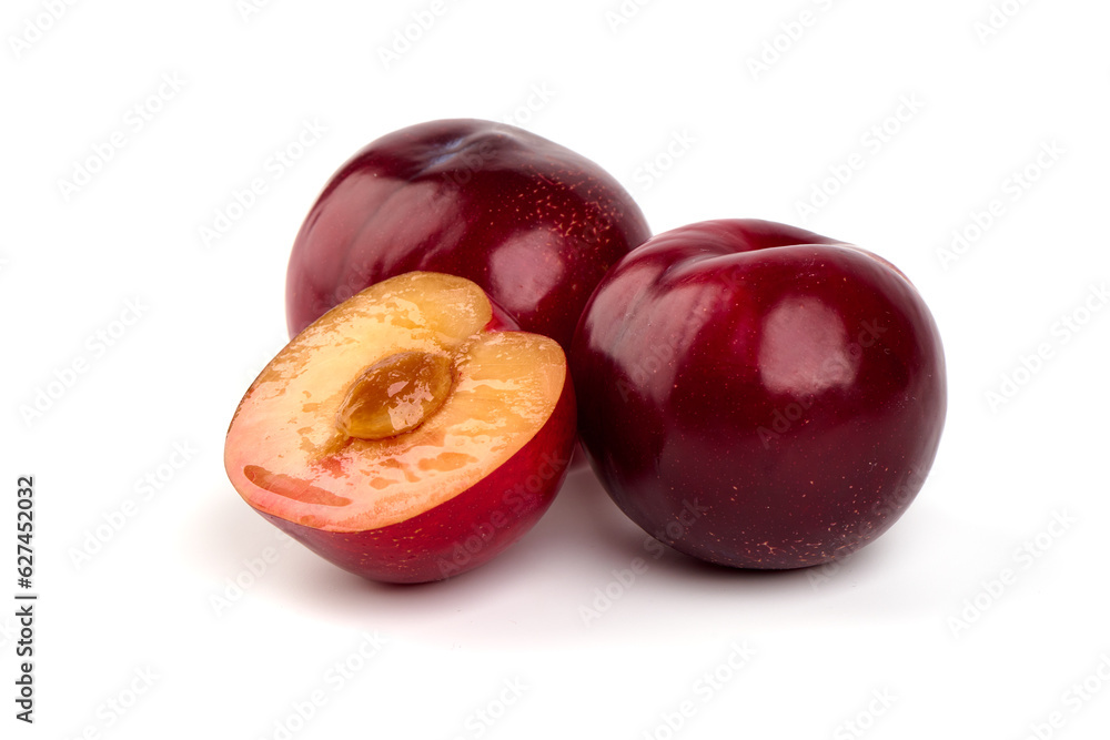 Fresh juicy plums, isolated on white background. Fresh juicy plums, isolated on white background.