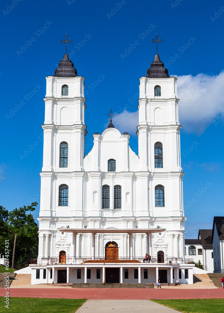 Beautiful white Chatolic Church in Latvia ,Aglona, nice blue sky and white clouds