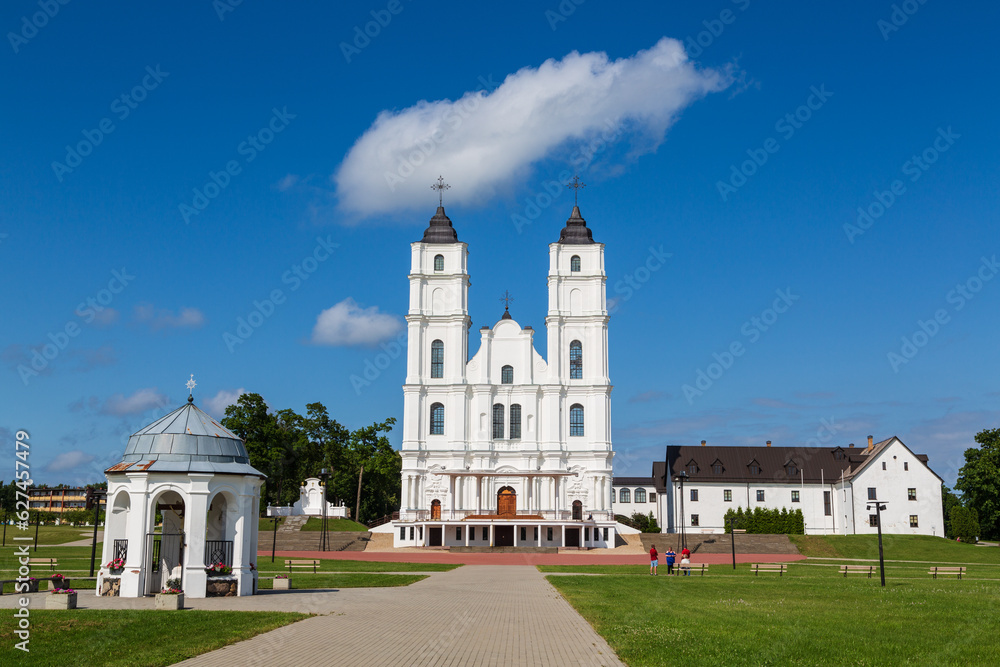 Beautiful white Chatolic Church in Latvia ,Aglona, nice blue sky and white clouds