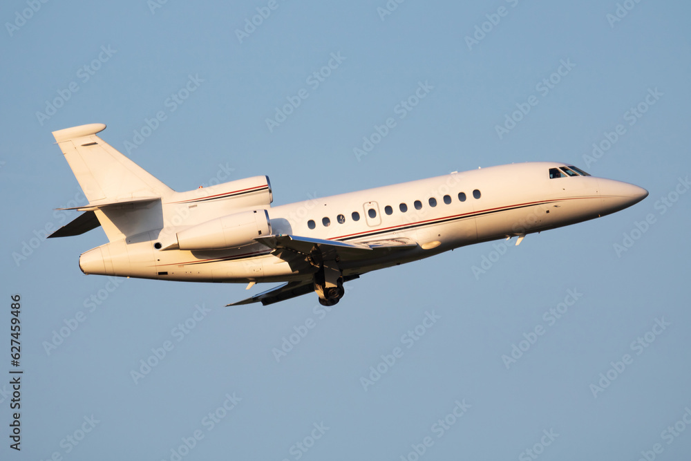Obraz premium Untitled business jet passenger plane at airport. Corporate flight travel. Aviation and aircraft. Vip transport. Company and corporation transportation. Fly and flying.