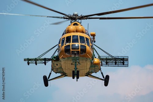 Untitled military helicopter at air base. Air force and army flight transportation. Aviation and rotorcraft. Transport and airlift. Military industry. Fly and flying.