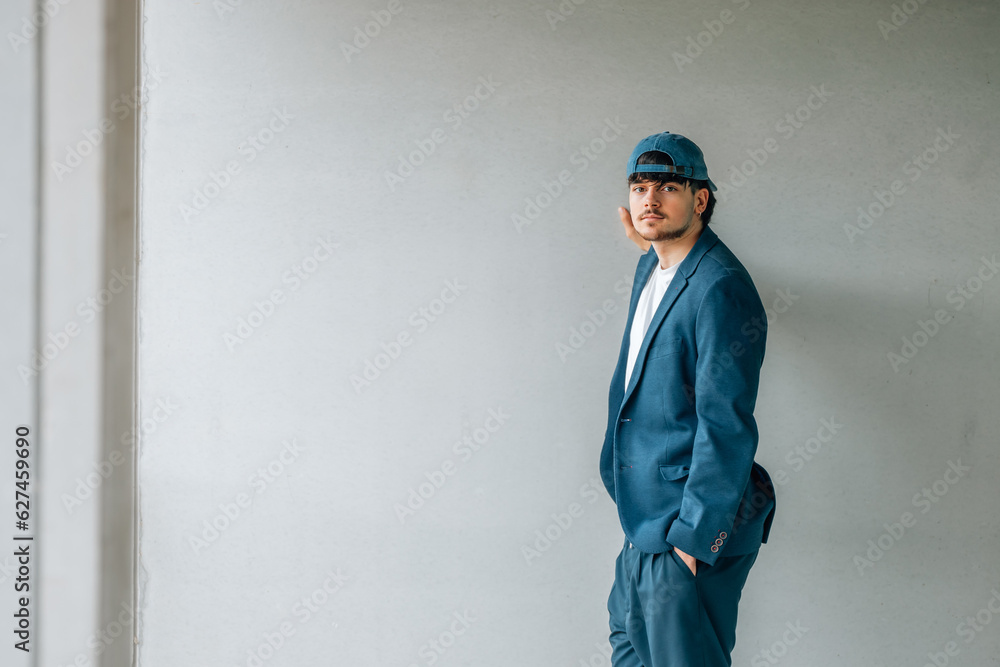 Naklejka premium young man or student with college uniform