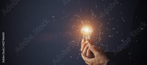 Knowledge idea bulb concept. Electric light bulb in hand business manager. Innovation, brain, creative concept