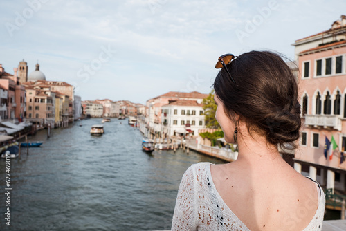 Beautiful female model on the streets of Venice, Italy © Adi Seres