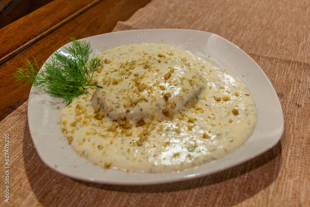 Meal in the coastal region of  Bulgaria - fish in a white sauce with dill