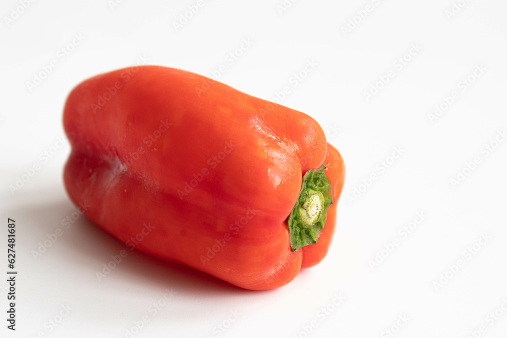 Slice of yellow bell pepper on a black background. Close up. Slice of yellow bell pepper on a black background. Close up.