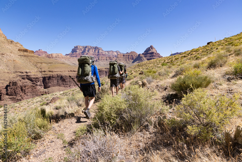 Hikers head along Grandview Trail in the Grand Canyon National Park Hikers head along Grandview Trail in the Grand Canyon National Park