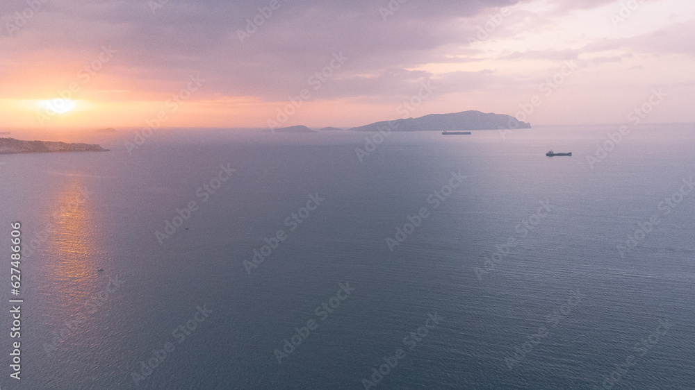 Aerial photos of the coast of Lechería, Anzoátegui State, los canals beach. Photos of the horizon over the sea, palya, oil tankers, sky, nbes, sunset