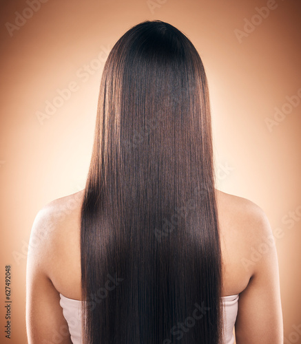 Back, straight hair and beauty of woman in studio isolated on a brown background. Haircare, natural cosmetics and model with salon treatment for balayage hairstyle, growth and aesthetic for wellness