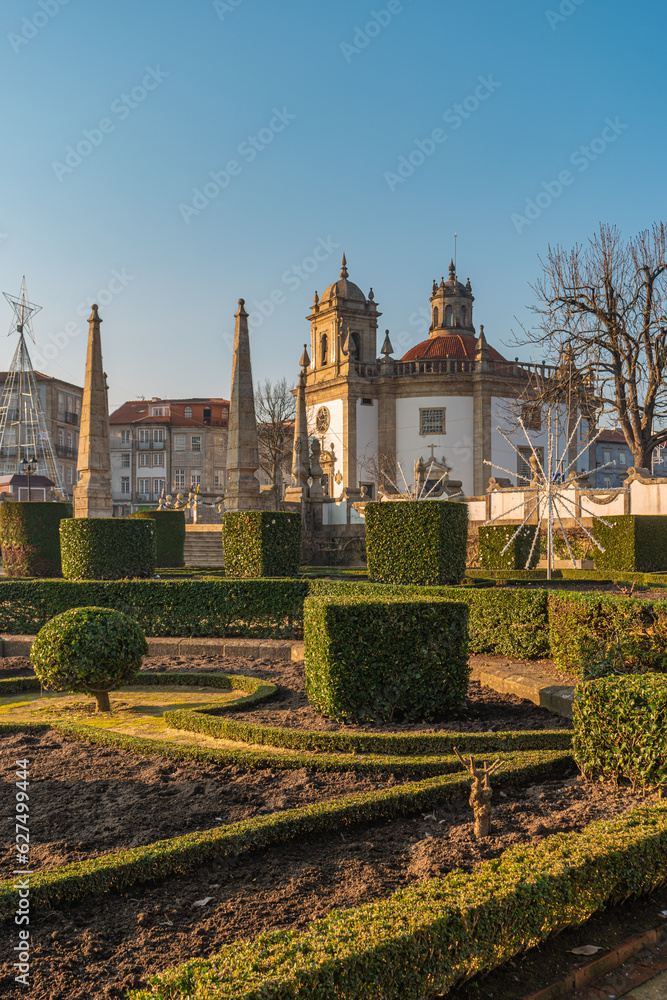 Fototapeta premium View at the Church Bom Jesus da Cruz with fountain in Barcelos. The town symbol is a rooster in Portuguese called Galo de Barcelos (Rooster of Barcelos).
