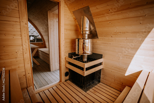 An igloo sauna made of wood, interior design, soft focus