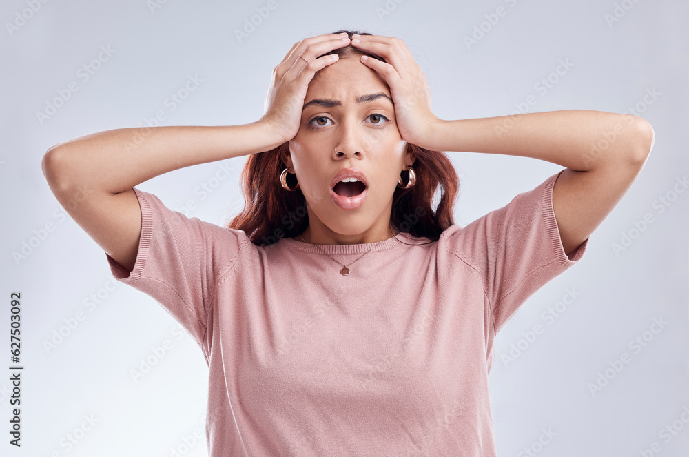 Mistake, wow and young woman in studio with hand on head for anxiety, stress or panic. Portrait of a shocked female model person on a white background with gossip, bad news and problem or fail Mistake, wow and young woman in studio with hand on head for anxiety, stress or panic. Portrait of a shocked female model person on a white background with gossip, bad news and problem or fail