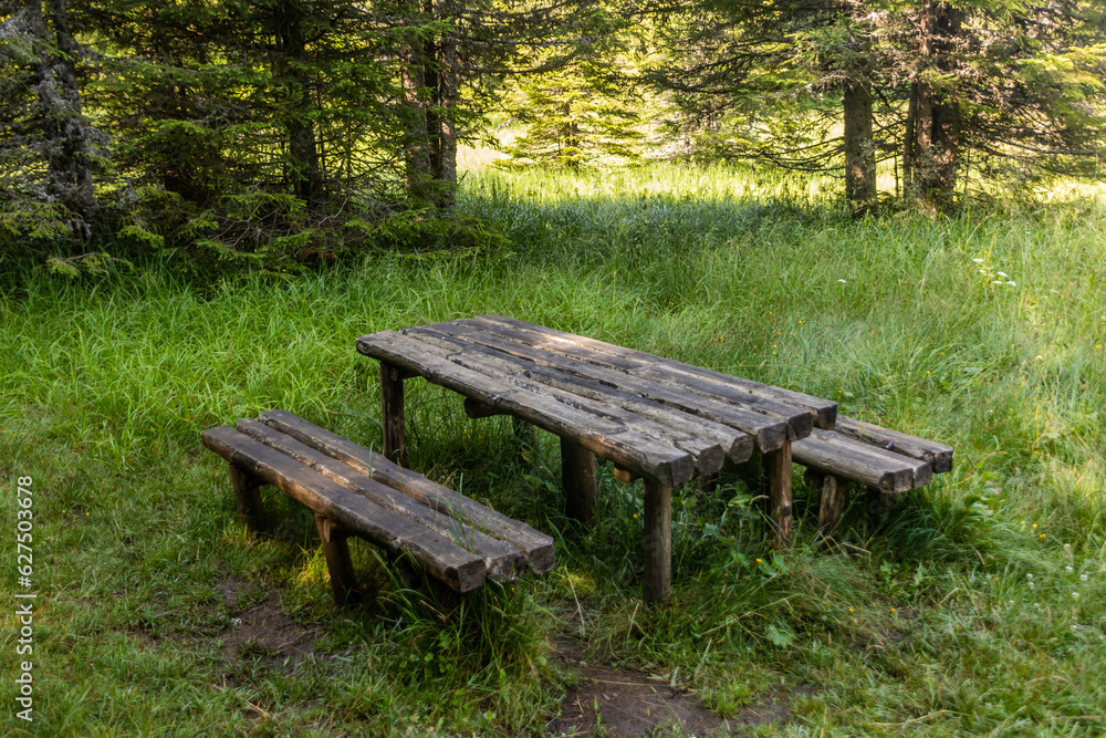 Picnic table in Rila mountains, Bulgaria Picnic table in Rila mountains, Bulgaria