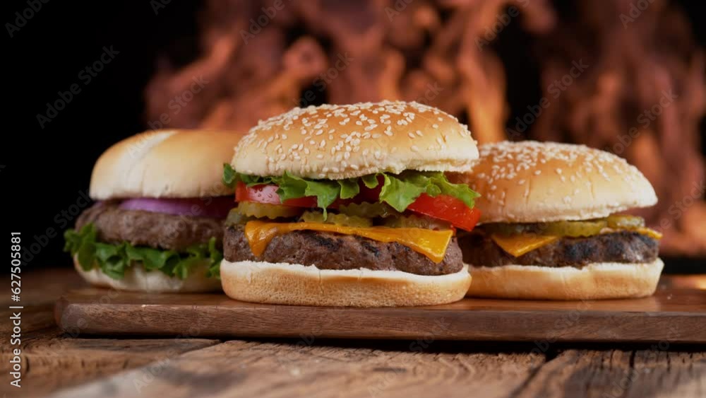 Hamburger with flames in slow motion. Hamburger with flames in slow motion.