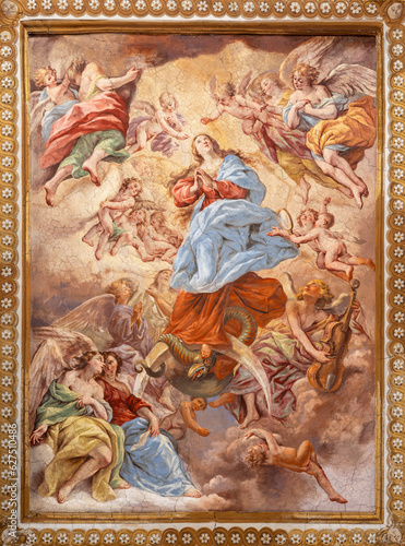 NAPLES, ITALY - APRIL 20, 2023: The fresco of Glory of Immaculate in church Basilica di Santa Maria degli Angeli a Pizzofalcone by Giovan Battista Beinaschi (1668-1675).
