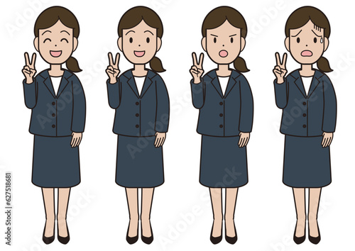 A young woman in a suit doing a peace sign