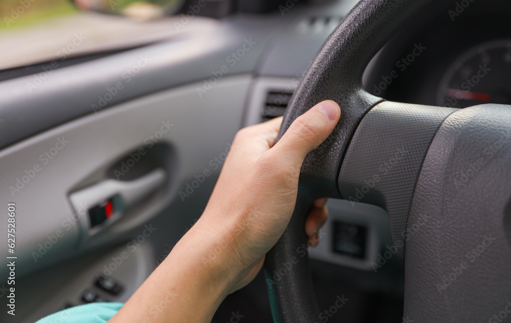 Freedom awaits, the hand on the car handle symbolizes new beginnings, journeys, and the thrill of embarking on adventures