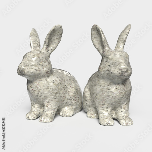 A cute white stone bunny on a whitebackground. Minimal color still life photography