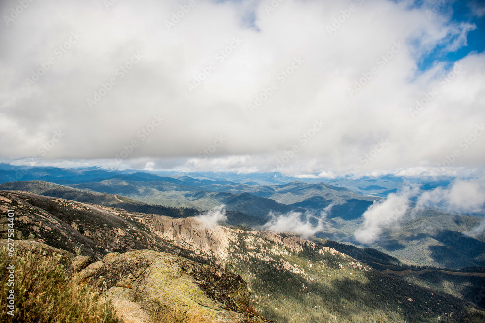 Mount Buffalo National Park, Victoria. Australia. Australian Alps views from the Horn picnic area. Mountains and clouds scenic view