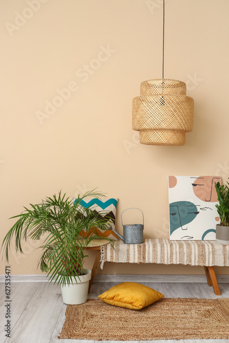 Interior of hall with bench and palm tree photo