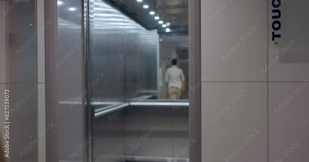 Elevator door, floor and business people busy in an office for corporate or professional work. Lift, exit and a group of employees, colleagues or coworkers in the lobby of a company workplace Elevator door, floor and business people busy in an office for corporate or professional work. Lift, exit and a group of employees, colleagues or coworkers in the lobby of a company workplace