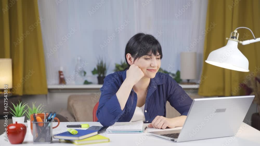 Female student talking with Dear on Facetime. Female student talking with Dear on Facetime.
